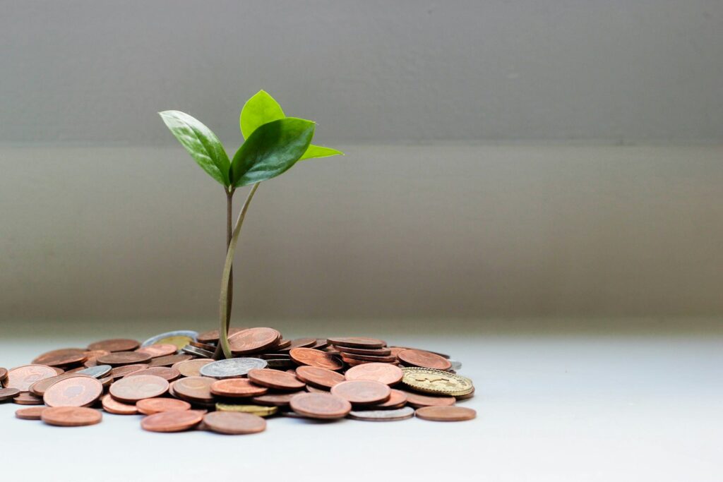 Desk with money and planning materials for an advertising budget