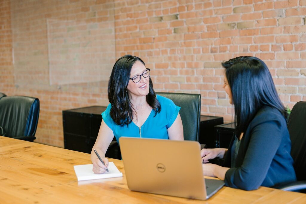 Business owner meeting to decide where to invest in marketing