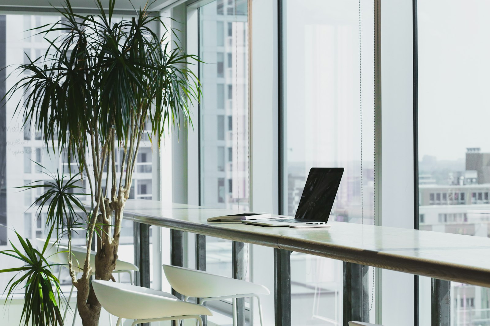 Laptop on a desk used to document a 90-day channel plan